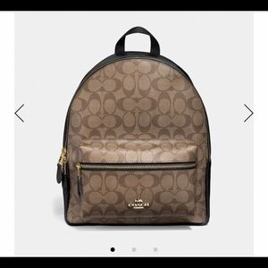 Authentic Coach Charlie backpack signature. NWT.